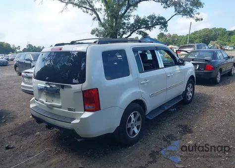 2011 Honda Pilot Touring z USA, uszkodzony, nr VIN 5FNYF4H97BB028586